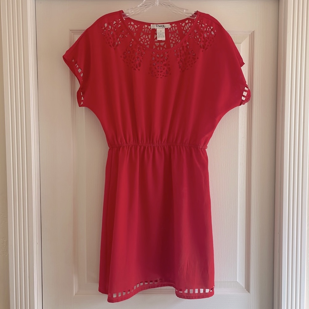 Medium Dress with fun design along them hem line and sleeves